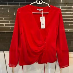 Naked Zebra red low cut wrap blouse, size small, never been worn!